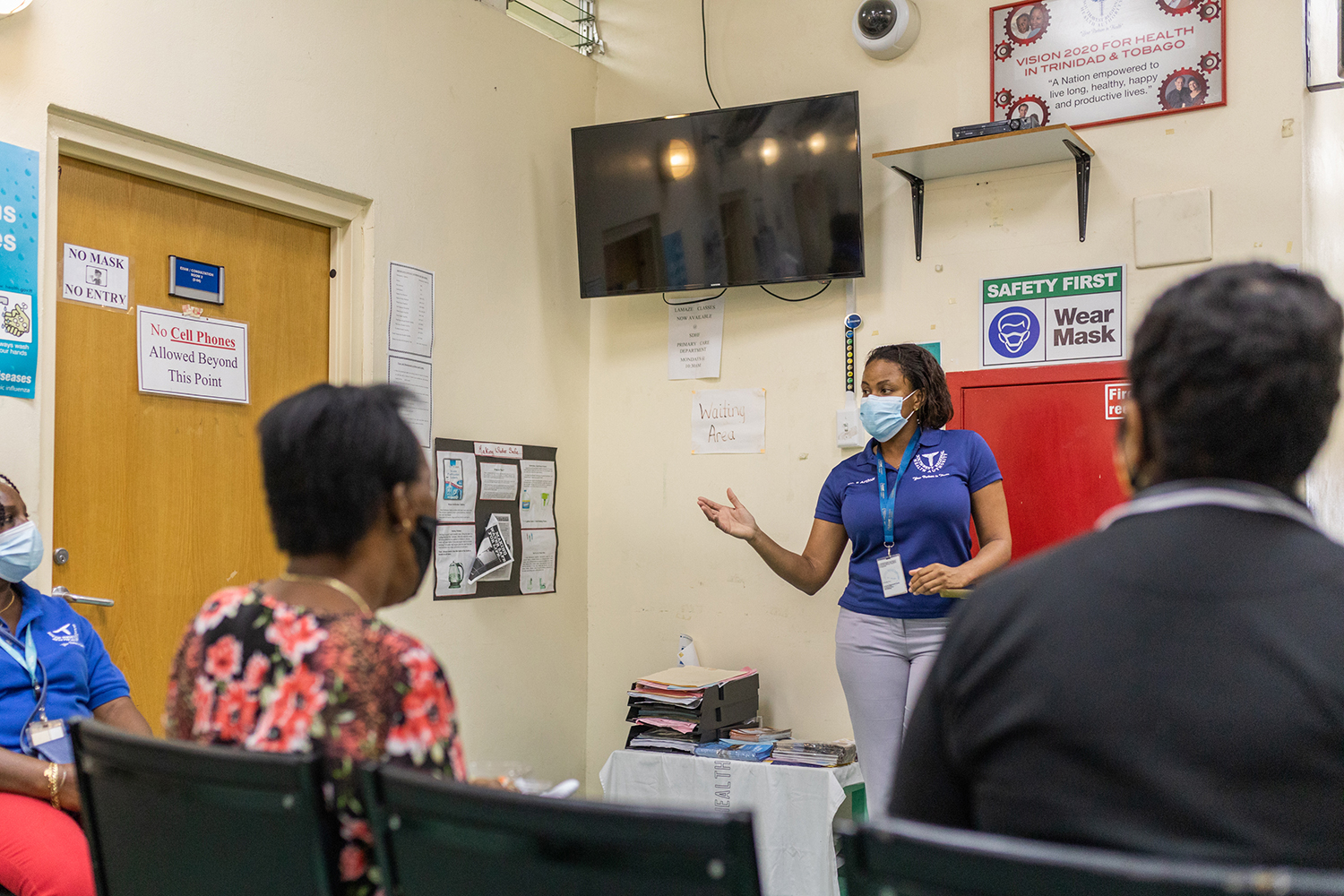During a simulation exercise on 6 March 2021, Dr Sandi Arthur answered questions from people acting as COVID-19 vaccine recipients. © WHO/ Kibwe Brathwaite