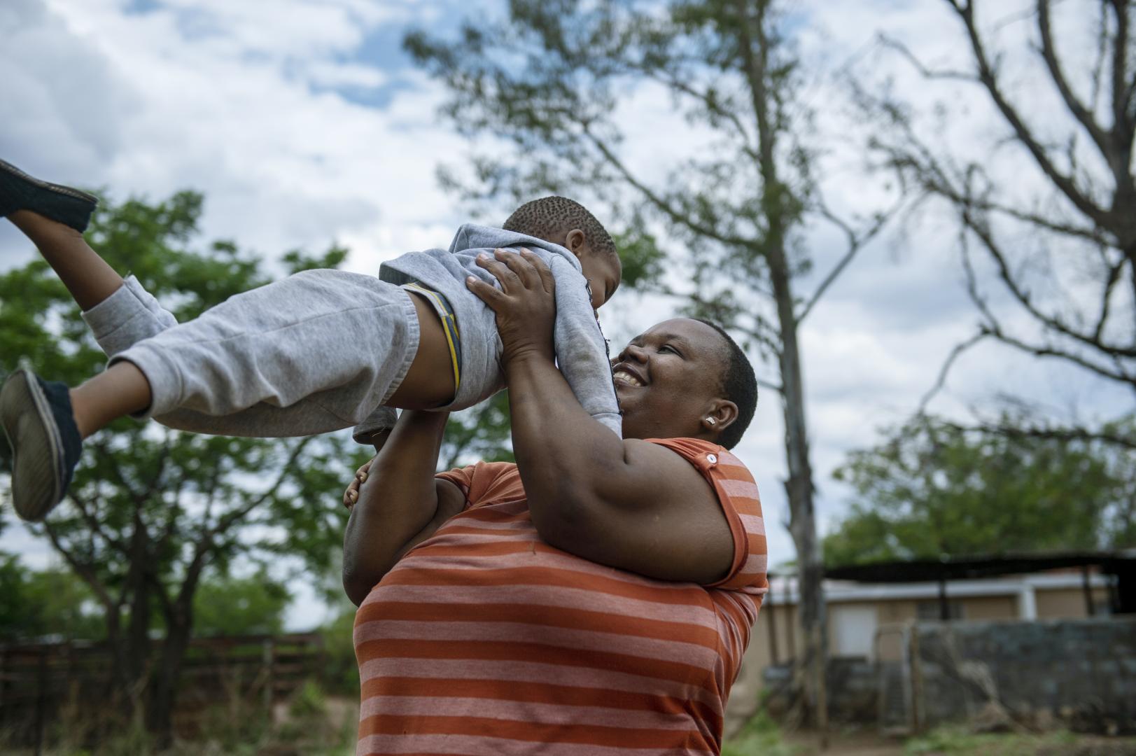 Dora who lives in Serowe village, Botswana, is happy because despite her HIV-positive status she did not transmit the virus to her baby