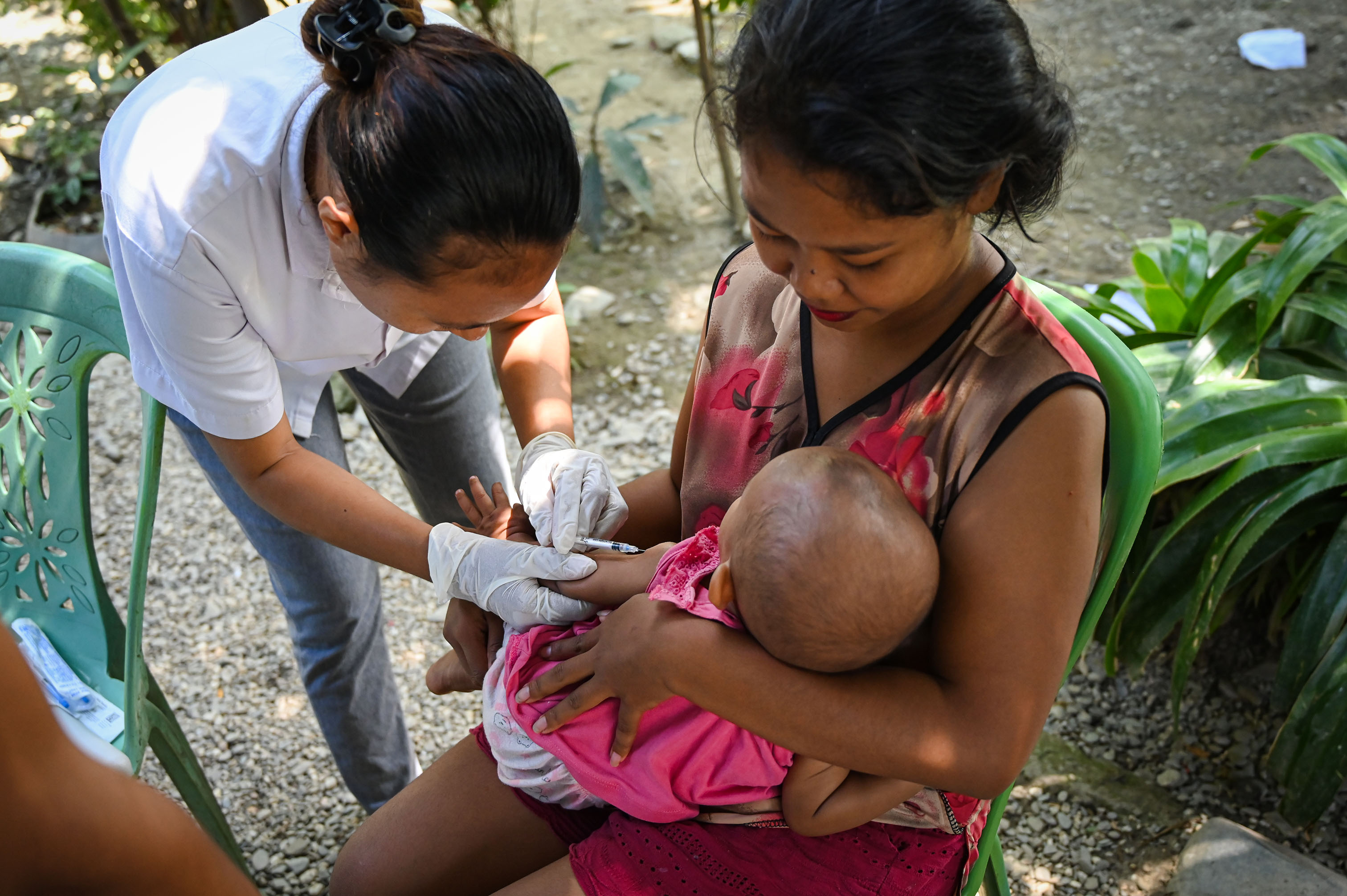 Child receiving immunization Child receiving immunization