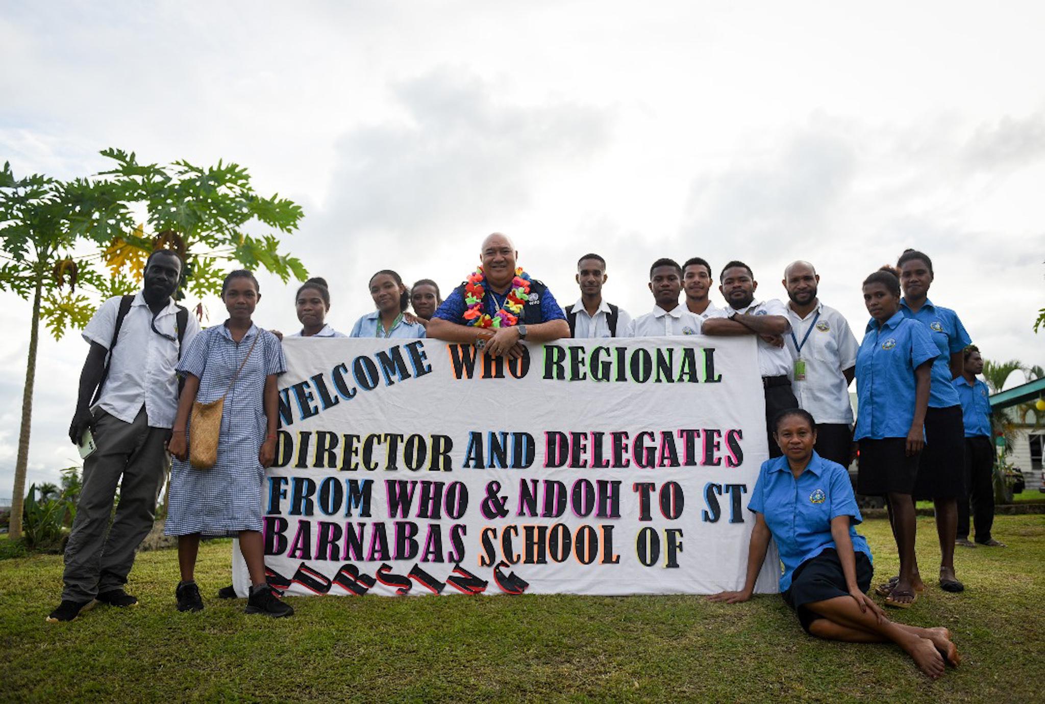 WHO Regional Director Dr Saia Piukala with Students a St Banabas School of Nursing after welcome.